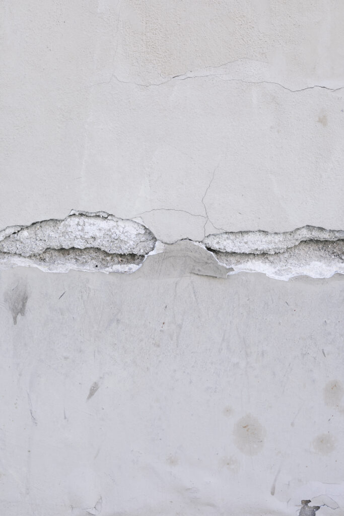 Plaster chipping off a wall